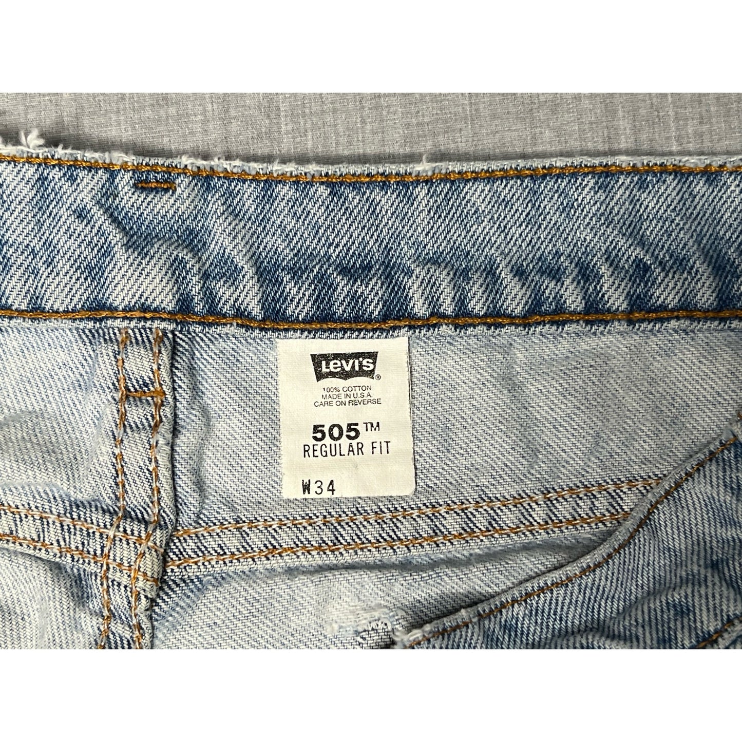 Vintage Levi’s 505 Orange Tab Light Wash Distressed Regular Fit Jean Shorts 34