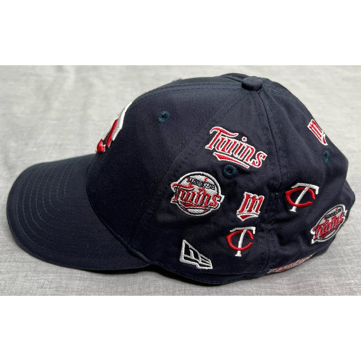 Minnesota Twins All Over Logo Strapback Hat New Era MLB Cap