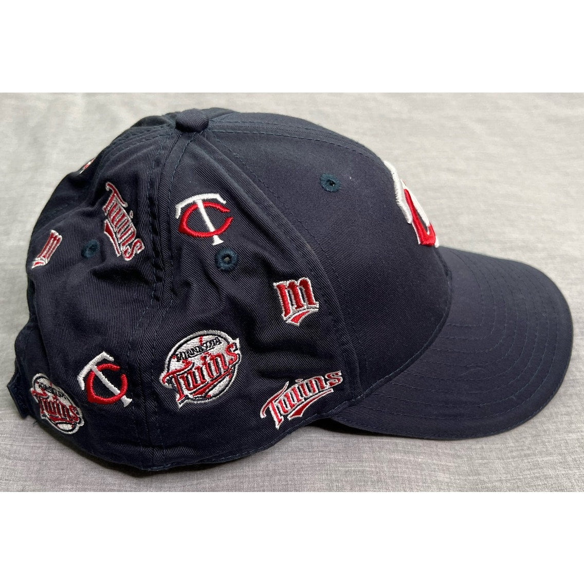 Minnesota Twins All Over Logo Strapback Hat New Era MLB Cap