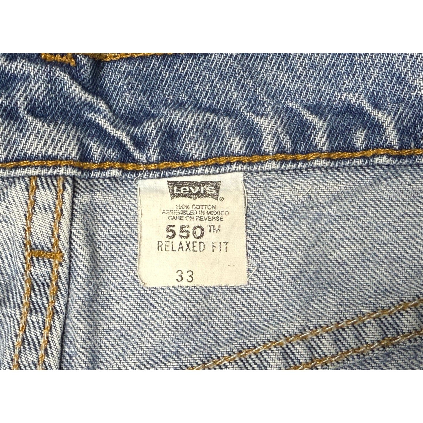 Vintage 90s Levi’s 550 Relaxed Fit Orange Tab Denim Jean Shorts 33