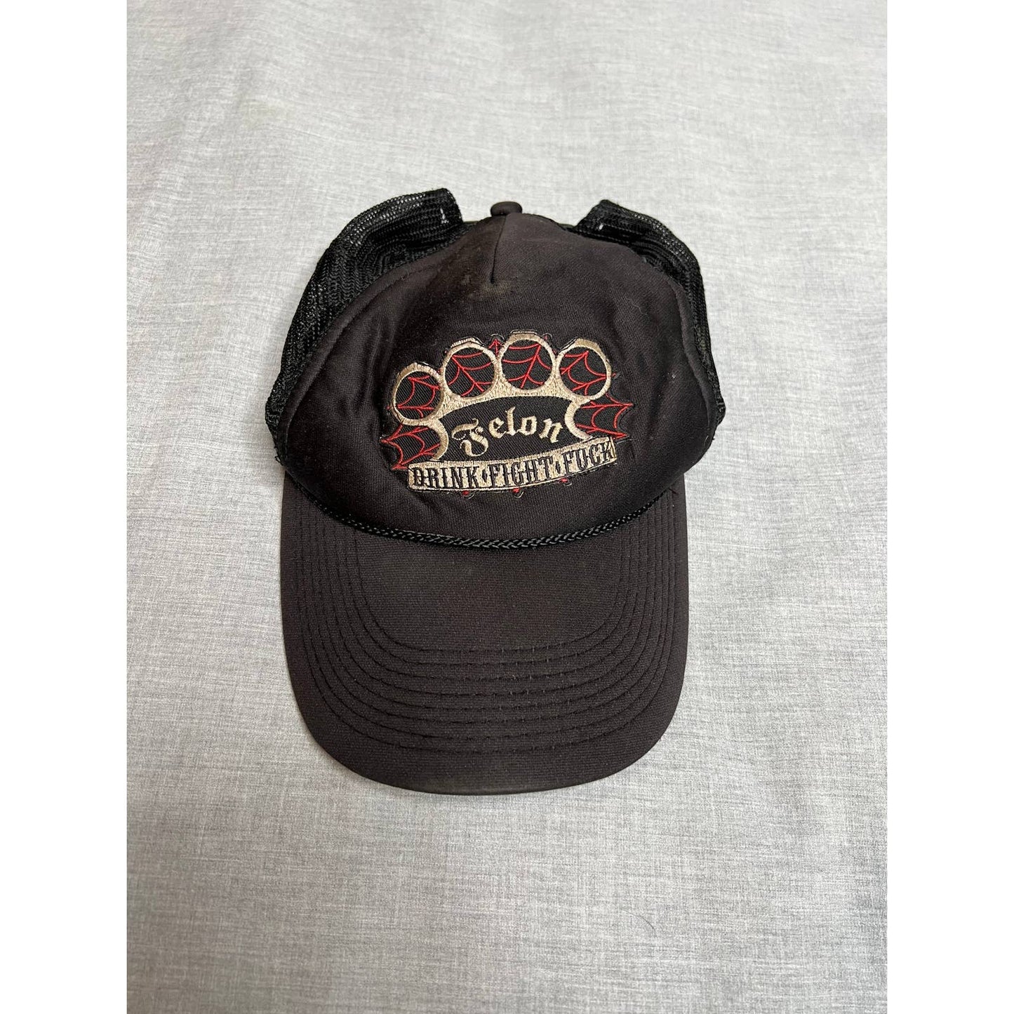 Felon Brass Knuckles Trucker Hat